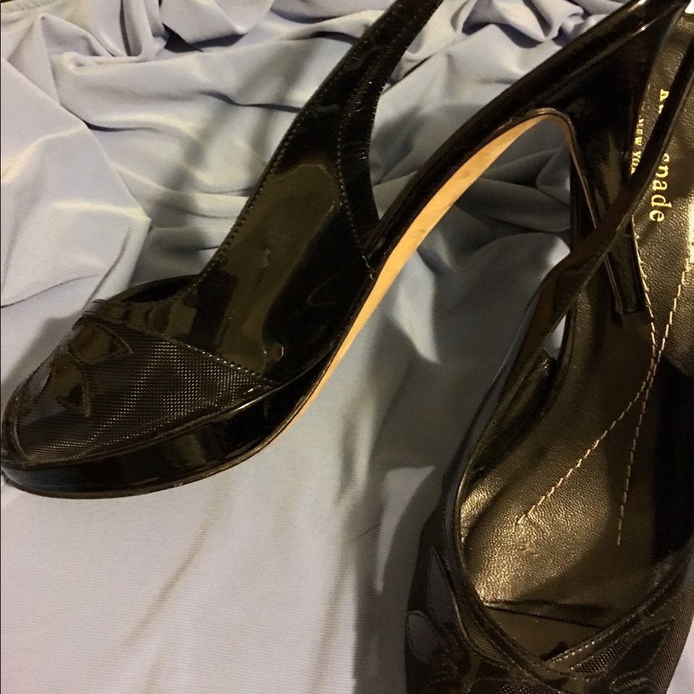 Walking in wonderful Kate Spade sling backs, add any outfit!